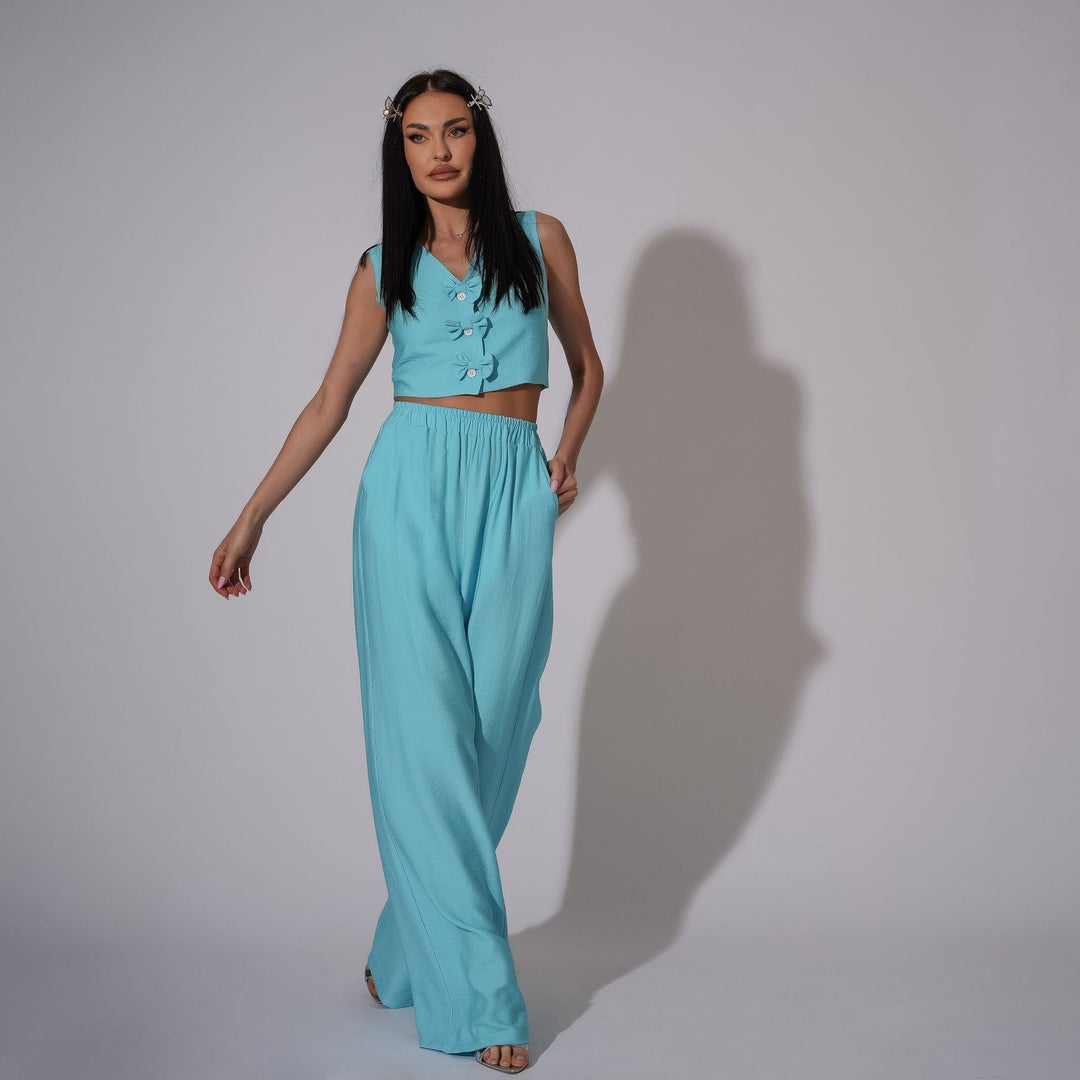 Carolina D: Compleu dama de vara din in format din vesta decorata cu fundite si pantaloni drepti